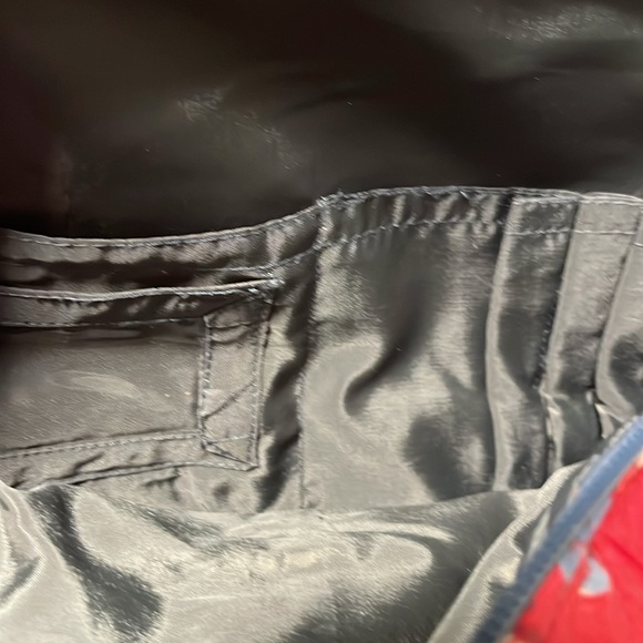 Backpack. Soft. A few compartments inside. - Picture 7 of 7